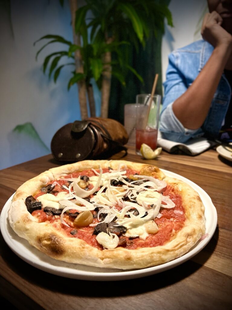 Pizza topped with vegetables