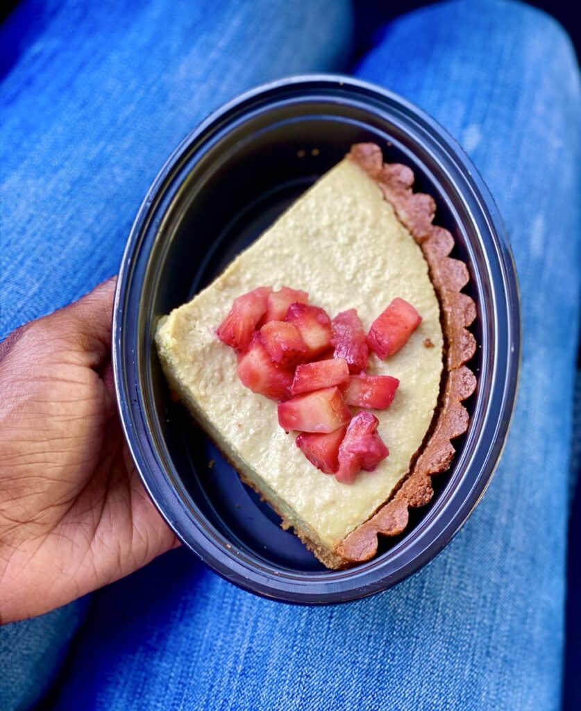 Slice of avocado tart with berries on top