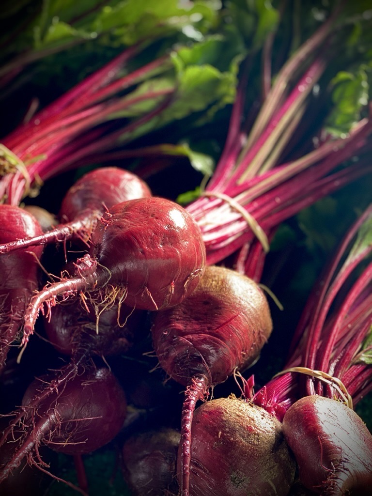 Fresh whole red beets with stems